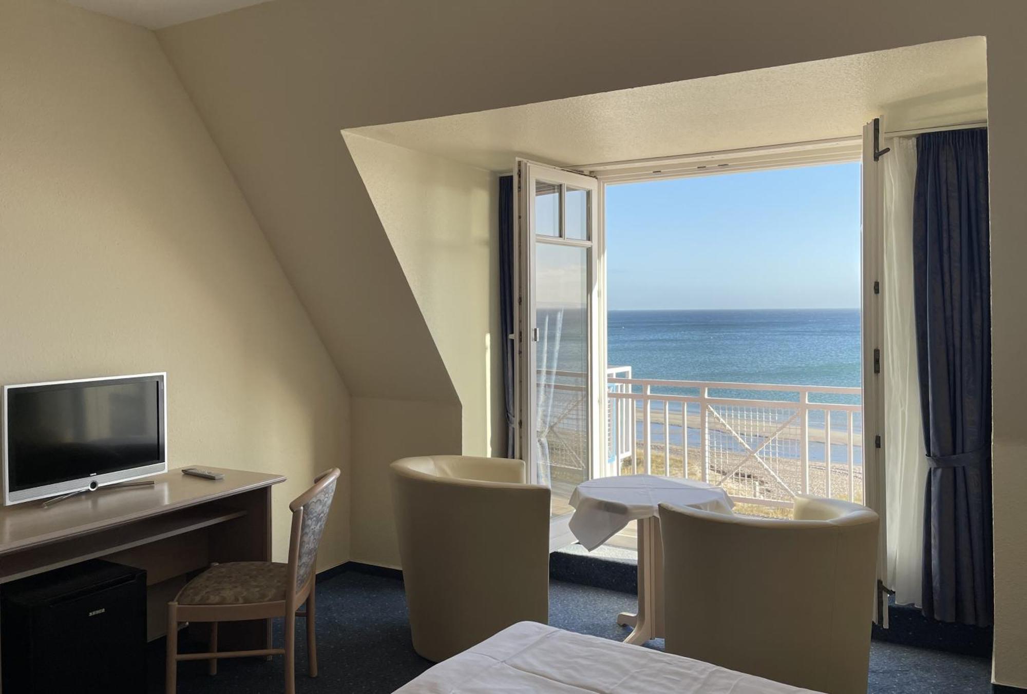 Strandhotel Duenenhaus Юліусрух Номер фото