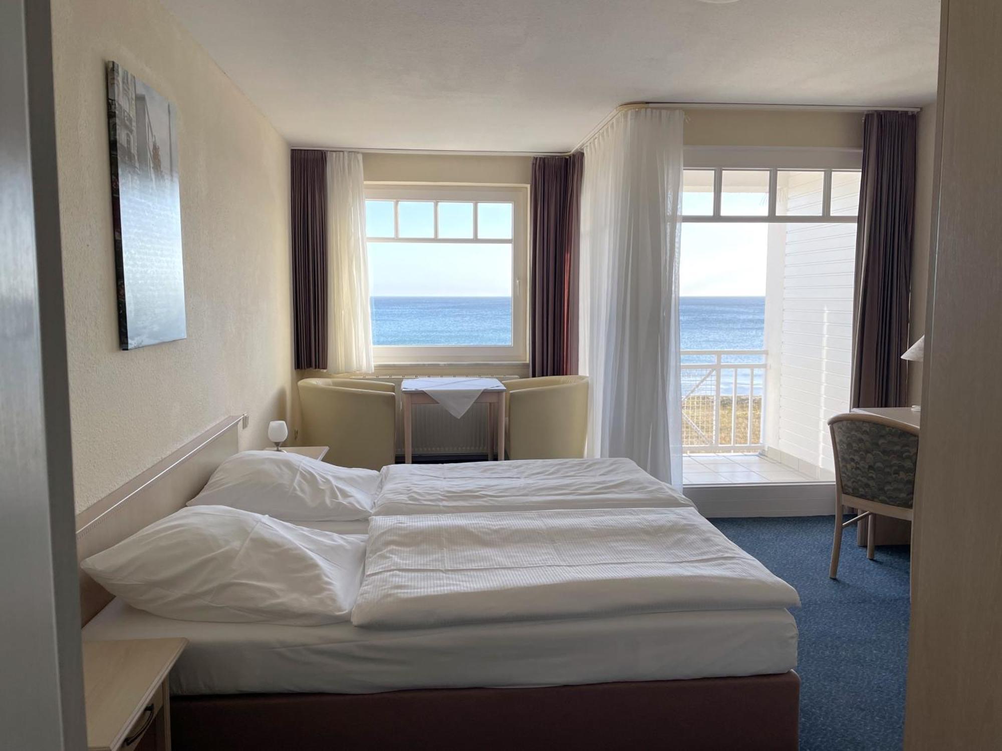 Strandhotel Duenenhaus Юліусрух Номер фото
