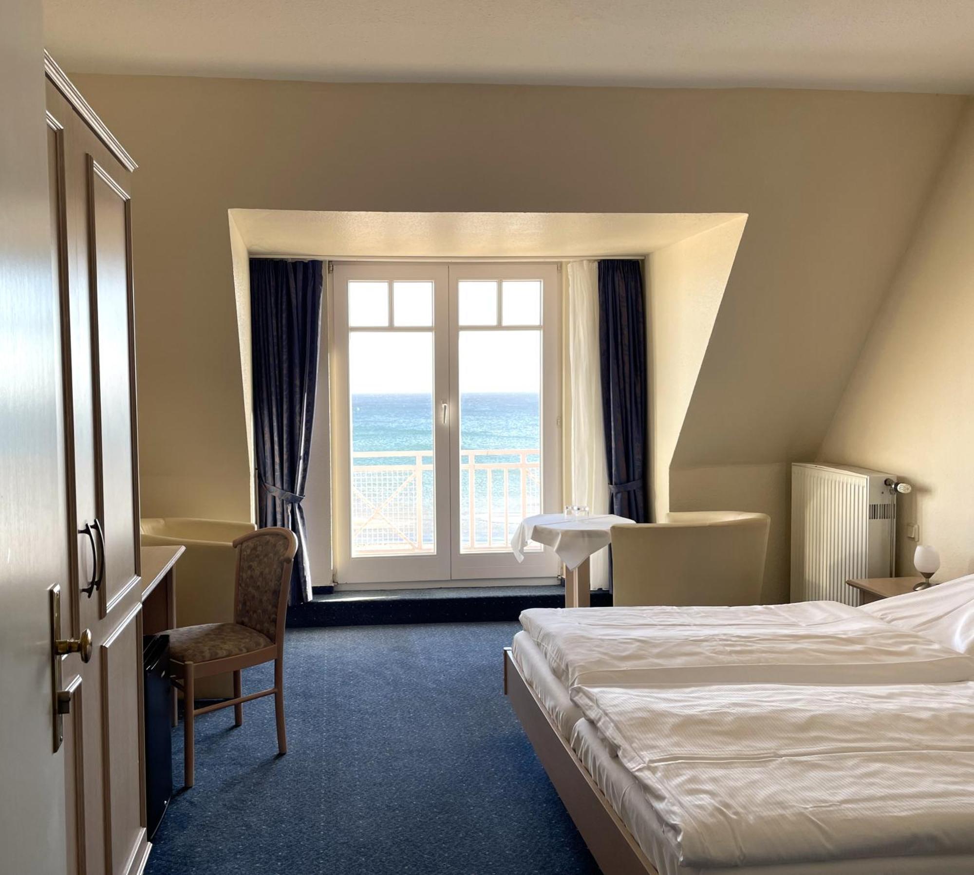 Strandhotel Duenenhaus Юліусрух Номер фото